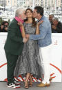 Director Pedro Almodovar, from left, actors Penelope Cruz and Antonio Banderas pose for photographers at the photo call for the film 'Pain and Glory' at the 72nd international film festival, Cannes, southern France, Saturday, May 18, 2019. (Photo by Joel C Ryan/Invision/AP)