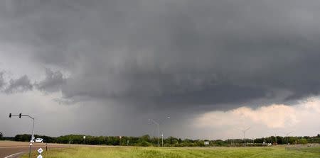 A severe thunderstorm wall cloud is seen over the area of Canton, Mississippi April 29, 2014. REUTERS/Gene Blevins