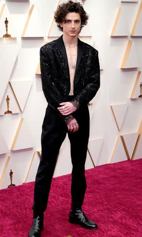 <p>Kevin Mazur/WireImage</p> Timothee Chalamet attends the 94th Annual Academy Awards on March 27, 2022 in Hollywood, California.