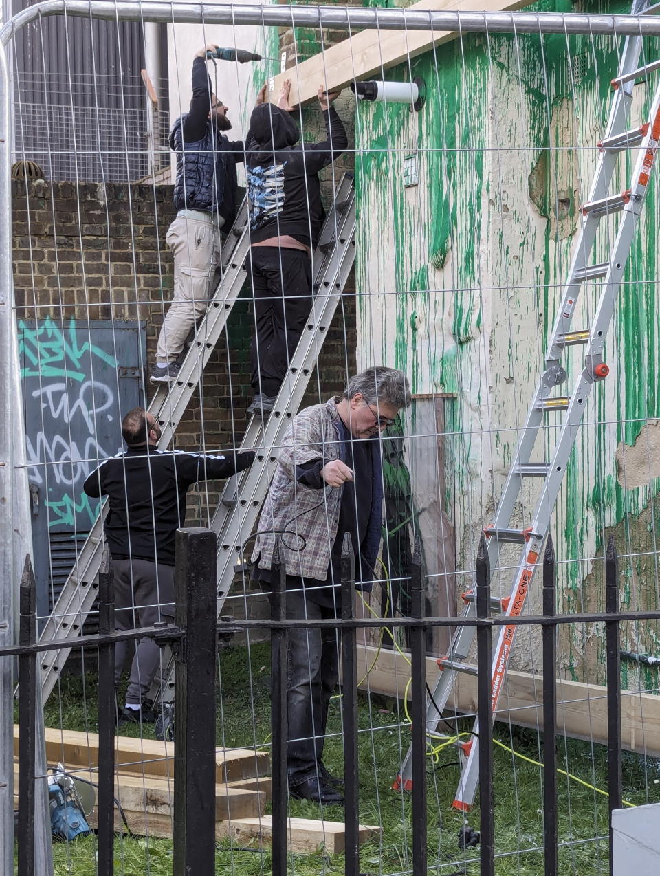 The man spotted by the latest large Banksy mural that passersby think is the elusive graffiti artist. Photo released March 25 2024. A Londoner has claimed a man hanging around the latest Banksy mural is Banksy himself. Pictures of a man hanging around the latest Banksy mural bear a striking resemblance to the man widely touted to be the mythologised street artist. The pictures, snapped at 10am on Saturday (March 23), were taken just outside Banksyâs latest mural in Finsbury Park, London.  They depict a man with greying hair and similar features to Robin Gunningham â the man many believe to be the true identity of Banksy.  