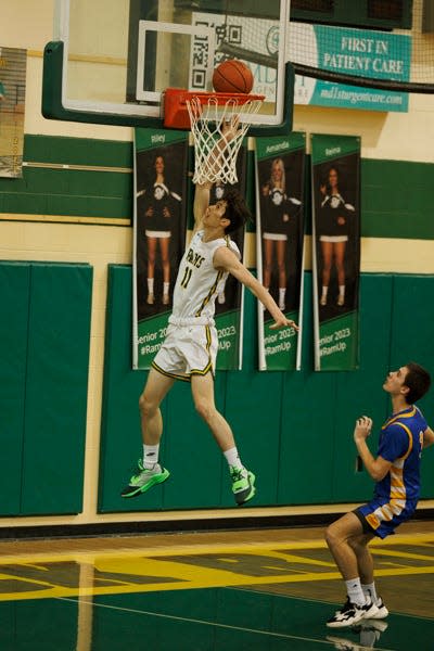 Flat Rock's Odin Nemeth drives for a layup against Jefferson on Friday, January 27, 2023.