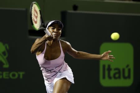 Mar 27, 2017; Miami, FL, USA; Venus Williams of the United States hits a forehand against Svetlana Kuznetsova of Russia (not pictured) on day seven of the 2017 Miami Open at Crandon Park Tennis Center. Williams won 6-3, 7-6(4). Geoff Burke-USA TODAY Sports