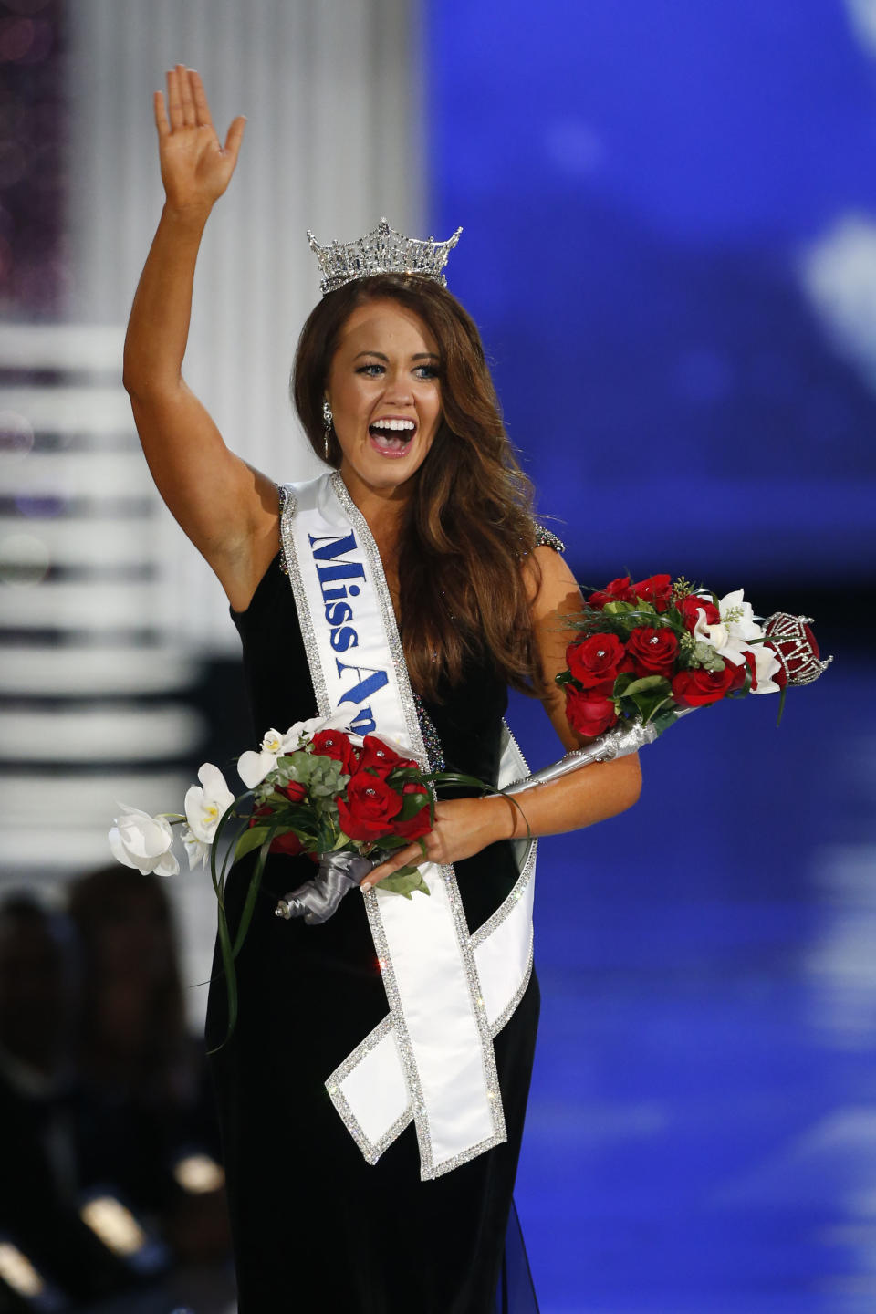 FILE - Miss North Dakota Cara Mund waves to the audience after being named Miss America during the Miss America 2018 pageant, Sunday, Sept. 10, 2017, in Atlantic City, N.J. Mund is running as an independent candidate for North Dakota’s lone U.S. House seat. (AP Photo/Noah K. Murray, File)