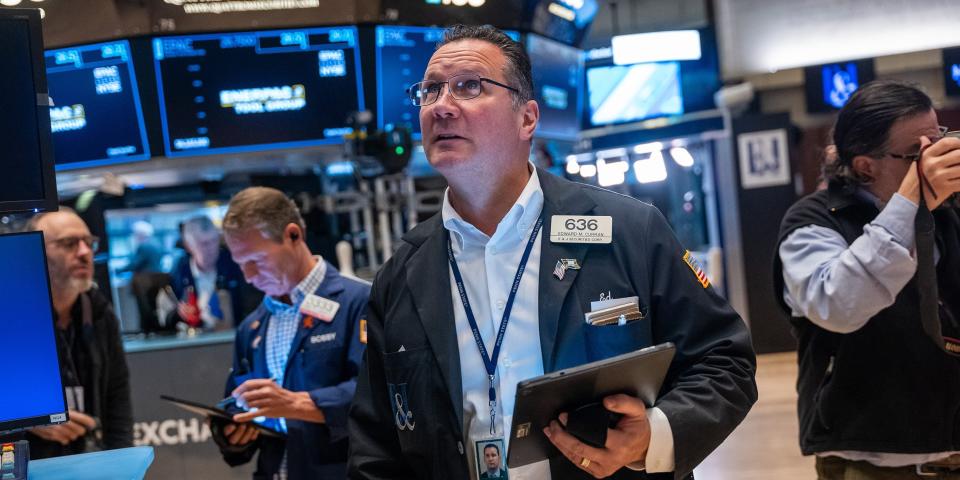 Traders work on the floor of the New York Stock Exchange (NYSE) on October 20, 2023 in New York City.