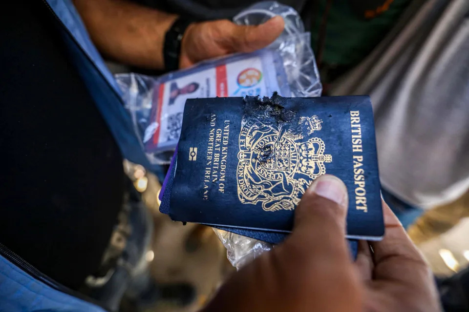 The passports of World Central Kitchen workers. (Ahmad Hasaballah / Getty Images)