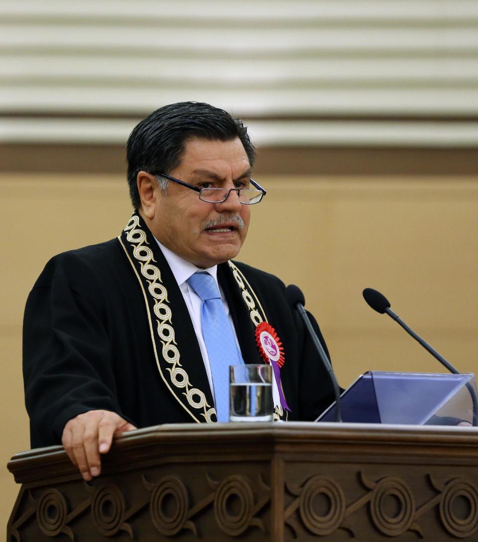 Constitutional Court Chief Justice Hasim Kilic speaks during a meeting in Ankara, Turkey, Friday, April 25, 2014. Turkey's most senior judge has delivered a sharp rebuke to Prime Minister Recep Tayyip Erdogan for criticizing his court's decisions, including one that lifted a ban on Twitter on the grounds that it violated freedoms. Erdogan reluctantly complied with the high court ruling to unblock Twitter earlier this month. Erdogan said, however, that he did not respect the ruling and described it as being against national interests. (AP Photo)