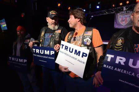 Veterans Bill "Chewy" Throckmorton (L), and Greg "Biggs" Bigger, both of Zelienople, Pennsylvania, talk during a Bikers for Trump 2016 rally at Jergel's Rhythm Grille in Warrendale, Pennsylvania April 24, 2016. REUTERS/Alan Freed/File Photo