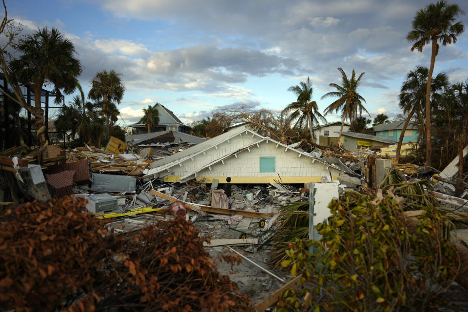 Only the roof remains of a home, Wednesday, Oct. 5, 2022, in Fort Myers Beach, Fla., after the passage of Hurricane Ian. (AP Photo/Rebecca Blackwell)