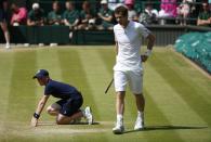 Great Britain's Andy Murray in his Men's Final against Serbia's Novak Djokovic during day thirteen of the Wimbledon Championships at The All England Lawn Tennis and Croquet Club, Wimbledon.