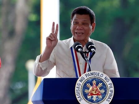 Philippine President Rodrigo Duterte speaks during a National Heroes Day commemoration at the Libingan ng mga Bayani (Heroes' Cemetery) in Taguig city, Metro Manila in the Philippines August 29, 2016. REUTERS/Erik De Castro