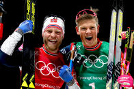 <p>Norway’s Martin Johnsrud Sundby and Johannes Hoesflot Klaebo celebrate their gold win in the Men’s Cross-Country Team Sprint Free Final at the Alpensia cross country ski centre during the Pyeongchang 2018 Winter Olympic Games on February 21, 2018.<br> (Photo by Odd Andersen/AFP/Getty Images) </p>