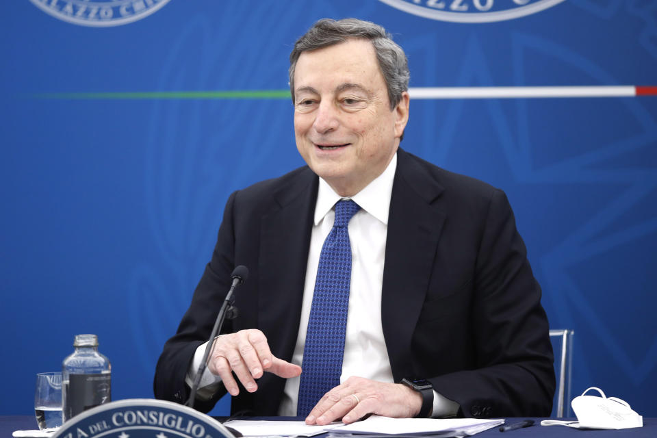 Italian Prime Minister Mario Draghi meets the press, in Rome, Friday, March 26, 2021. (AP Photo/Alessandra Tarantino, pool)