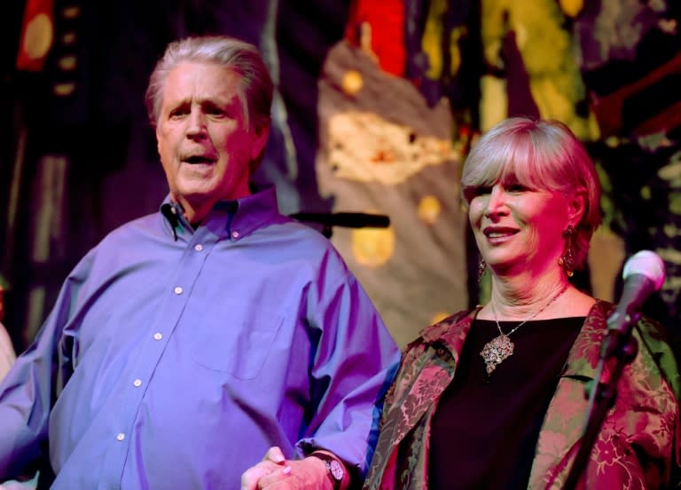 Brian Wilson is seen with his wife Melinda, whom he called his 'savior' and 'anchor'; she passed away in late January at 77 (KEVIN WINTER)