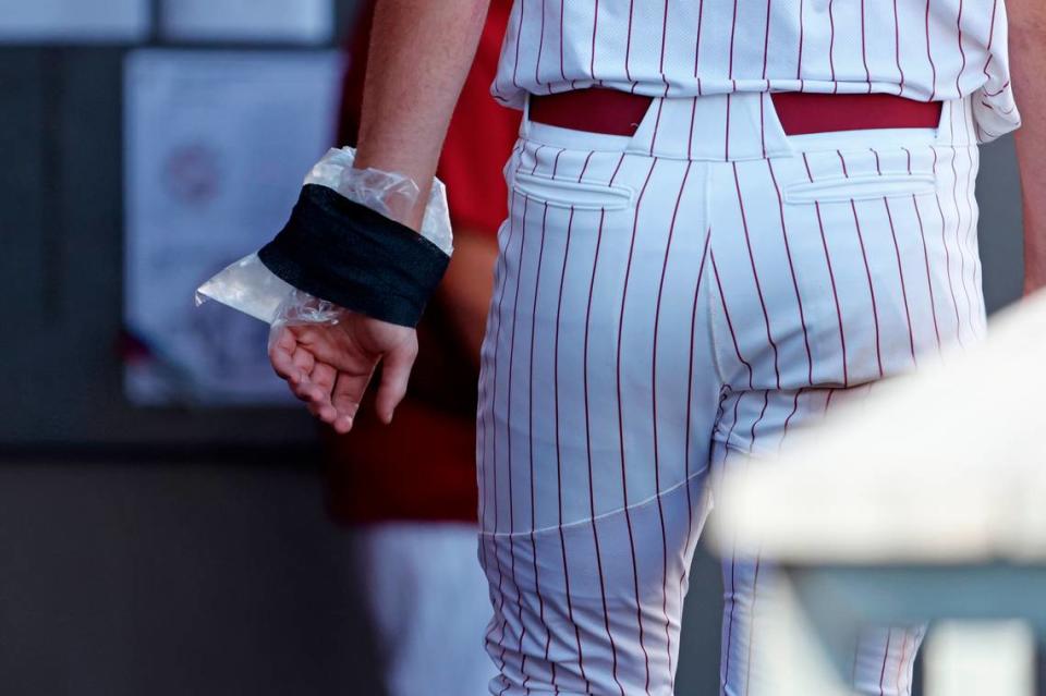 South Carolina’s Ethan Petry (20) has his hand in ice after being hit by a pitch against James Madison during an NCAA college regional baseball game in Raleigh, N.C., Friday, May 31, 2024.