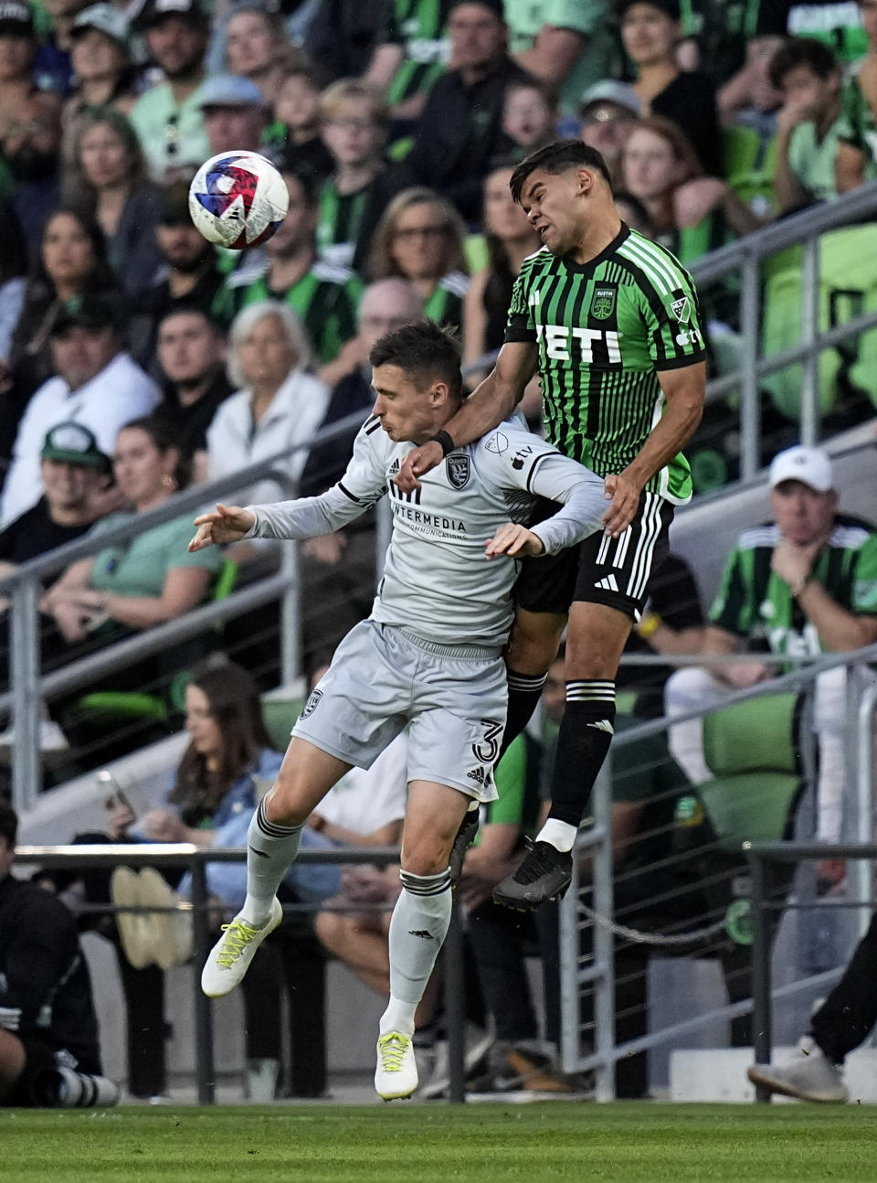 Austin FC forward Rodney Redes (11) heads the ball past San Jose Earthquakes defender Paul Marie (3) during the first half of an MLS soccer match in Austin, Texas, Saturday, April 29, 2023. (AP Photo/Eric Gay)