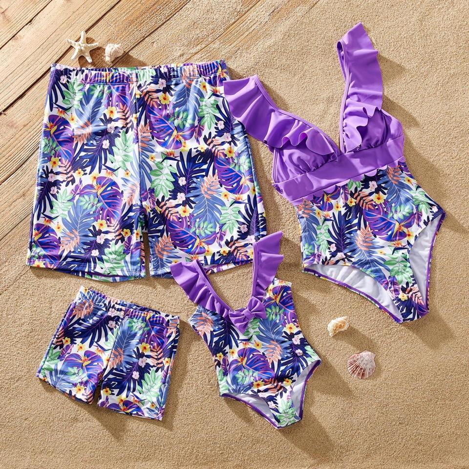 <p><a href="https://go.redirectingat.com?id=74968X1596630&url=https%3A%2F%2Fwww.walmart.com%2Fip%2FPatPat-Women-One-Piece-Swimsuits-Tummy-Control-High-Waist-V-Neck-Tropical-Family-Matching-Bathing-Suit-Set%2F1856495288&sref=https%3A%2F%2Fwww.thepioneerwoman.com%2Ffashion-style%2Fg60500788%2Fmatching-family-swimsuits%2F" rel="nofollow noopener" target="_blank" data-ylk="slk:Shop Now;elm:context_link;itc:0;sec:content-canvas" class="link ">Shop Now</a></p><p>Purple Tropical Family Swimsuits</p><p>walmart.com</p><p>$14.99</p><span class="copyright">Walmart</span>