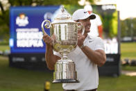 Brooks Koepka holds the Wanamaker trophy after winning the PGA Championship golf tournament at Oak Hill Country Club on Sunday, May 21, 2023, in Pittsford, N.Y. (AP Photo/Abbie Parr)