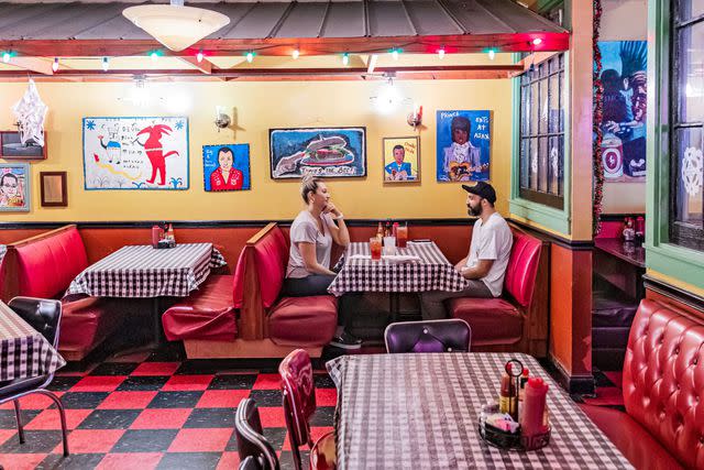 Robbie Caponetto Checkered tablecloths and red booths are the calling cards at Ajax Diner.
