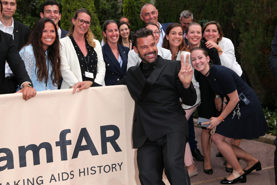 Ricky Martin poses with fans outside the amfAR Cannes Gala 2022 - Credit: Gisela Schober/Getty Images for amfAR