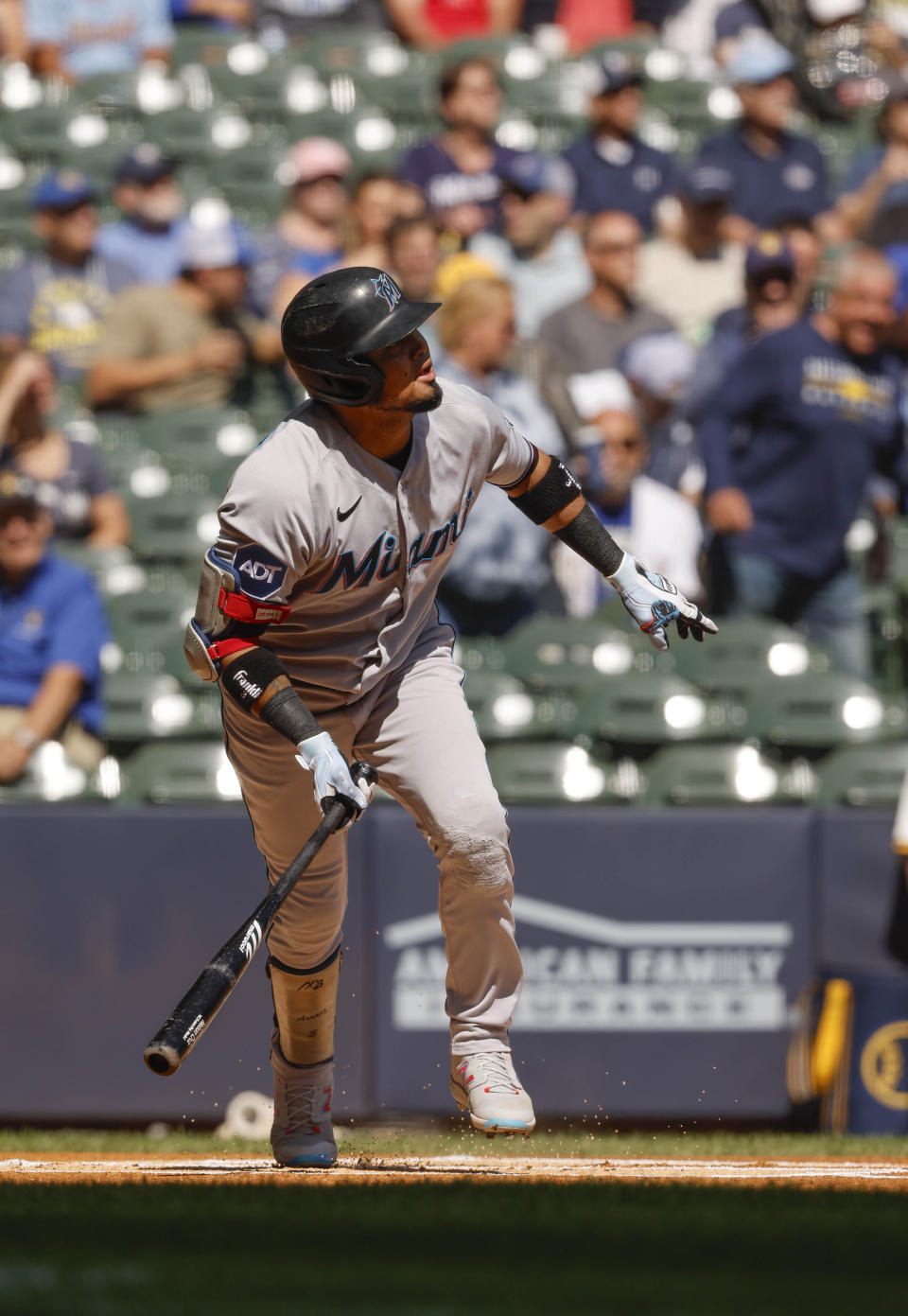 Miami Marlins' Luis Arraez (3) watches his double against the Milwaukee Brewers during the first inning of a baseball game Thursday, Sept. 14, 2023, in Milwaukee. (AP Photo/Jeffrey Phelps)