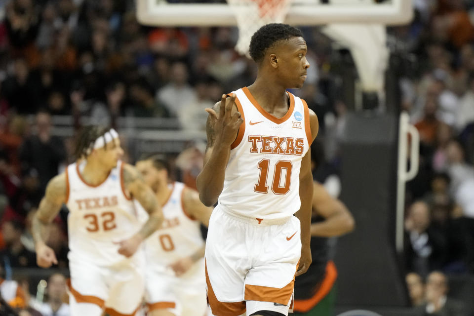 Texas guard Sir'Jabari Rice celebrates after scoring against Miami in the first half of an Elite 8 college basketball game in the Midwest Regional of the NCAA Tournament Sunday, March 26, 2023, in Kansas City, Mo. (AP Photo/Jeff Roberson)