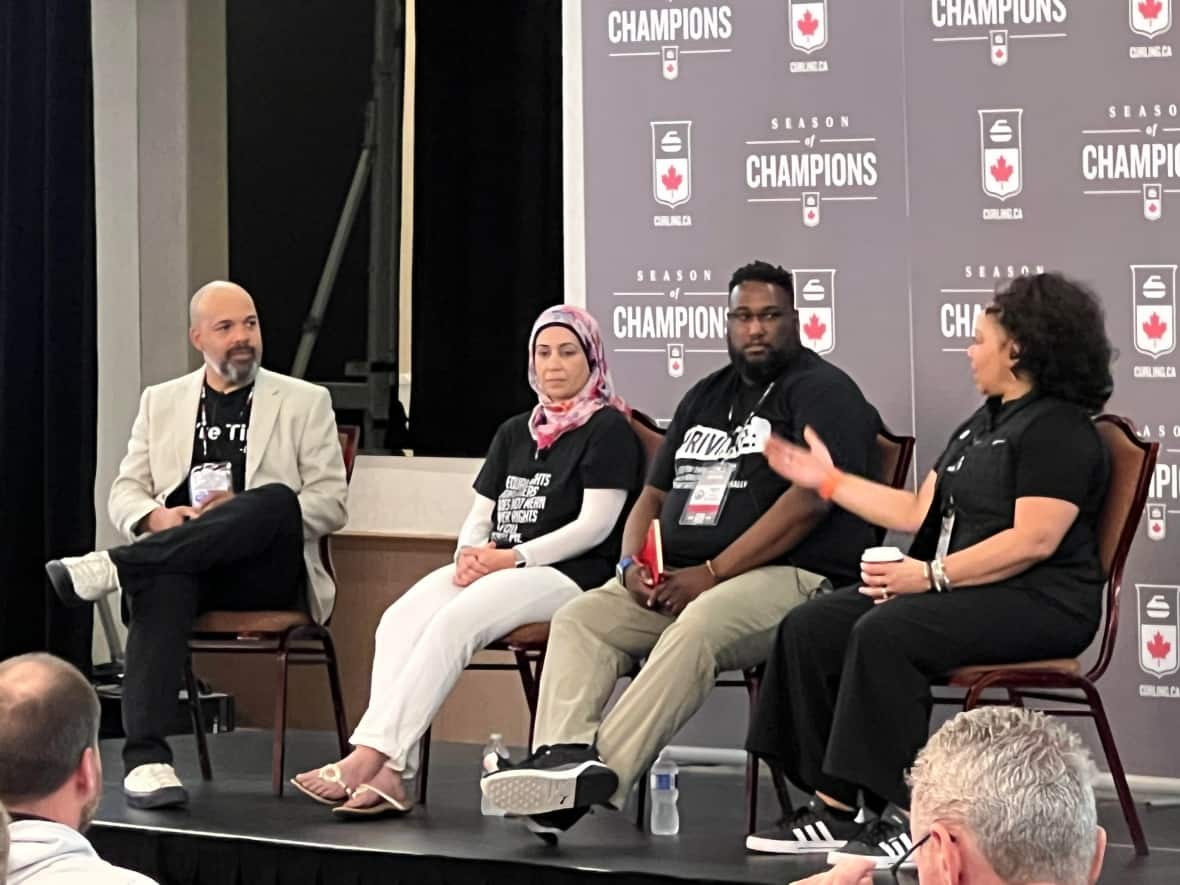 Members of the curling community unite in a Niagara Falls hotel Thursday at the 