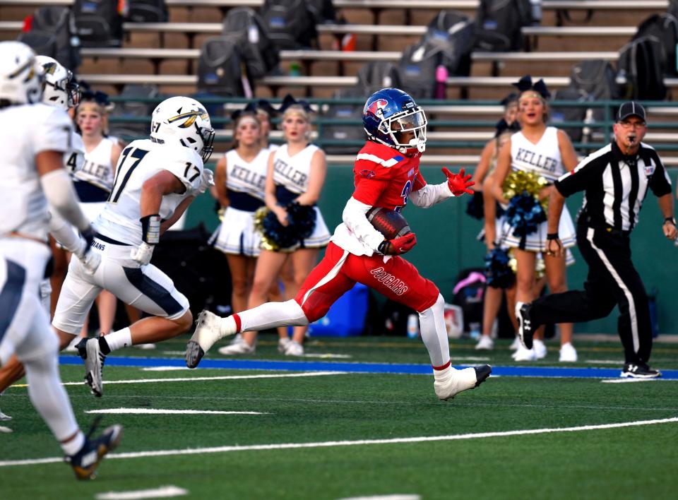 Cooper running back Daniel Bray sprints downfield for a touchdown against Keller last season at Shotwell Stadium.