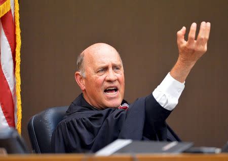 Fulton County Superior Court Judge Jerry Baxter describes his feelings when sentencing the Atlanta Public school educators for racketeering charges in one of the largest U.S. test-cheating scandals in Atlanta, Georgia April 14, 2015. REUTERS/Kent D. Johnson/Pool