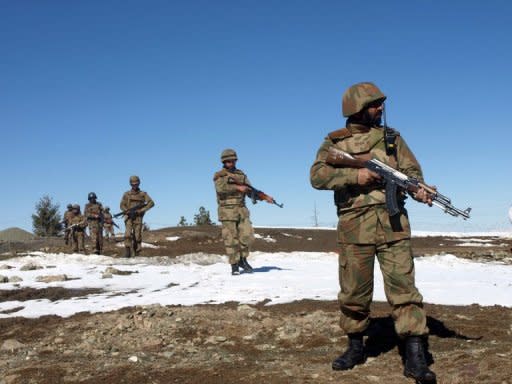 Pakistani soldier patrol the mountainous area near the town of Pash Ziarat in North Waziristan. Pakistan has told Washington that US forces must seal the Afghan border in the event of any offensive against the Al-Qaeda-linked Haqqani network in North Waziristan, an official has told AFP