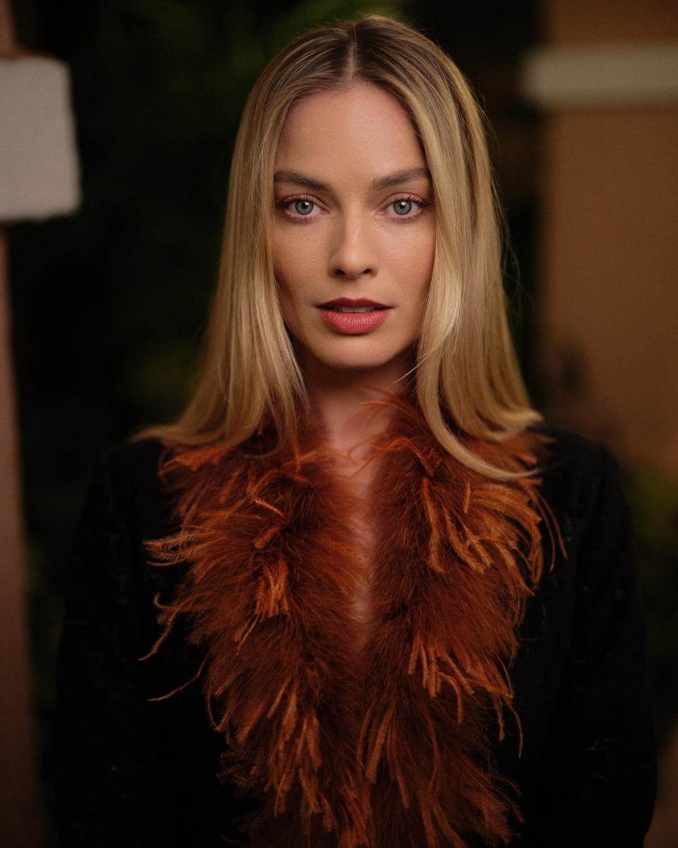 Margot Robbie, wearing Chanel, attends the Chanel and Charles Finch 15th annual pre-Oscars dinner at the Beverly Hills Hotel's Polo Lounge on March 9, 2024.