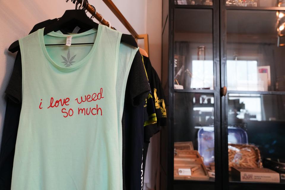 A cannabis-themed shirt is seen on display at Austinite Cannabis Co. on Wednesday, April 17, 2024.