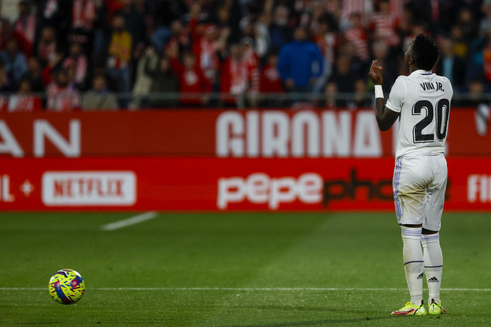 Real Madrid's Vinicius Junior reacts after Girona's Taty Castellanos scoring his side's third goal during a Spanish La Liga soccer match between Girona and Real Madrid, at the Montilivi stadium in Girona, Spain, Tuesday, April 25, 2023. (AP Photo/Joan Monfort)