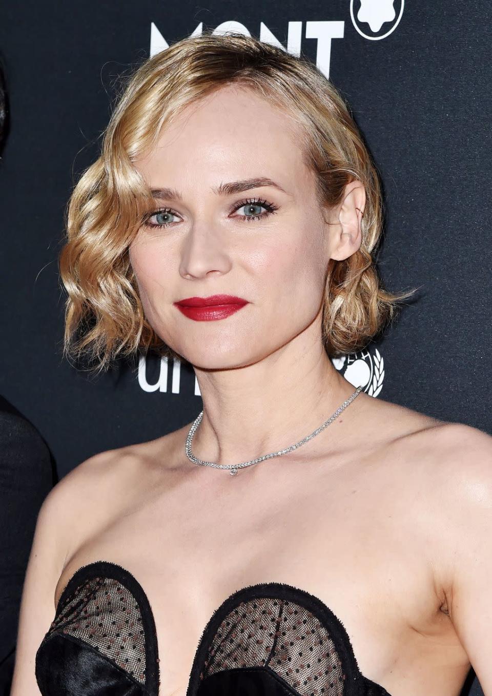 <p>We're feeling serious Roxie Hart vibes from Diane Kruger's 20s style bob.</p>