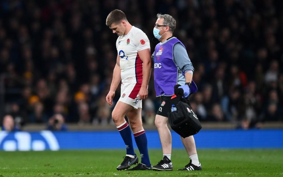 Owen Farrell of England leaves the pitch after picking up an ankle injury during the Autumn Nations Series match between England and Australia - Getty Images