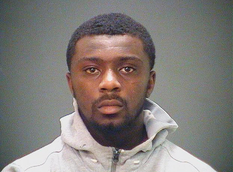 Booking photo provided by the Cuyahoga County Sheriff's Office shows Frank Q. Jackson, grandson of Cleveland Mayor Frank Jackson, after he was taken into custody in an assault case after an Ohio mayor negotiated his surrender to the U.S. Marshal's Office. He was granted bond and was placed under house arrest with electronic GPS monitoring. A woman who says her son was killed by gang members connected to Frank Q. Jackson had filed a wrongful death lawsuit saying that the mayor and a police chief interfered in an investigation of the slaying. / Credit: Cuyahoga County Sheriff's Office via AP