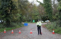 Police at Watlington Hill in Oxfordshire after the body of a woman was discovered at the National Trust estate, a man has been arrested on suspicion of murder and is being treated for serious injuries, police said.