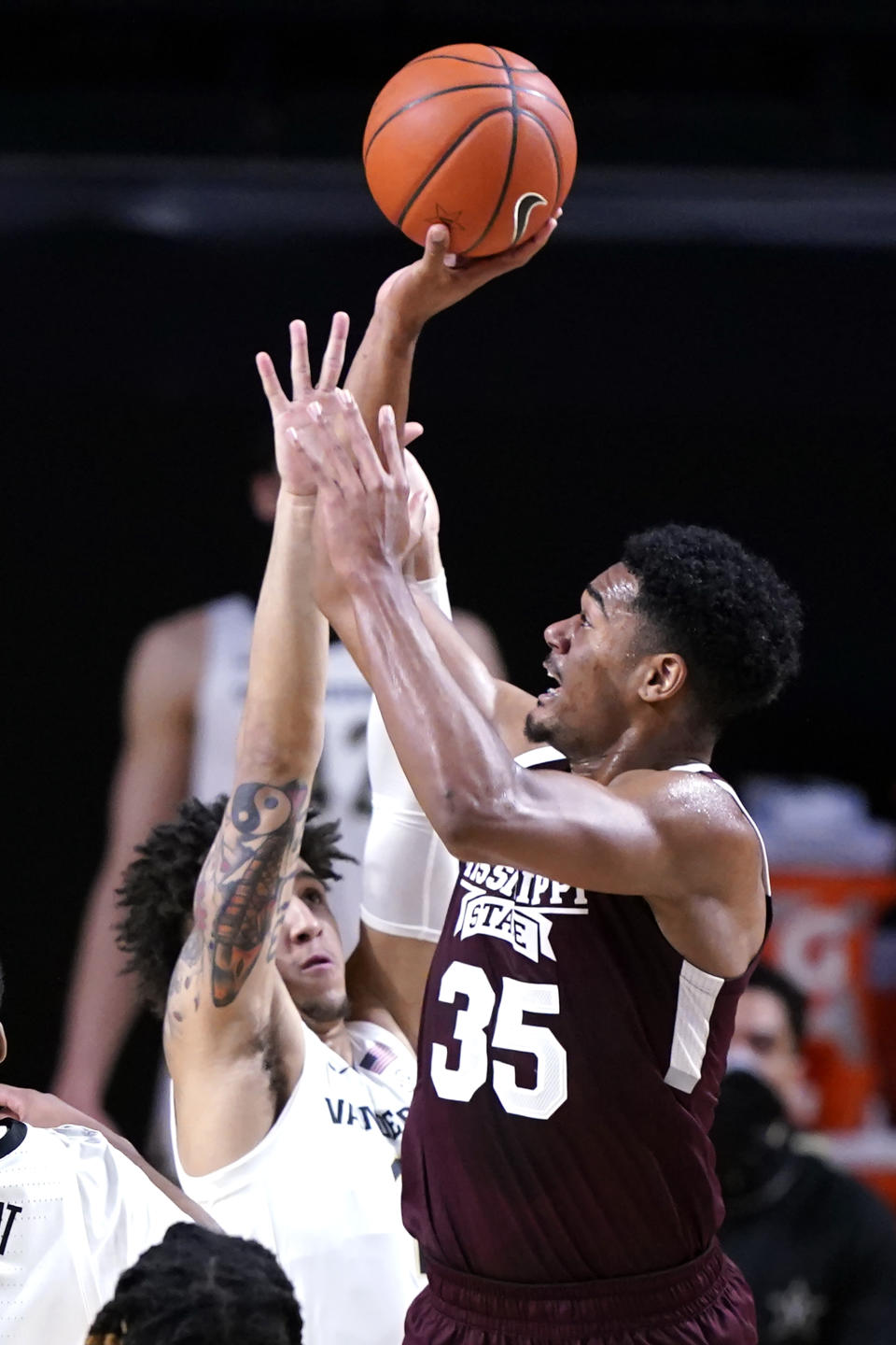 Mississippi State forward Tolu Smith (35) shoots over Vanderbilt forward Myles Stute in the first half of an NCAA college basketball game Saturday, Jan. 9, 2021, in Nashville, Tenn. (AP Photo/Mark Humphrey)