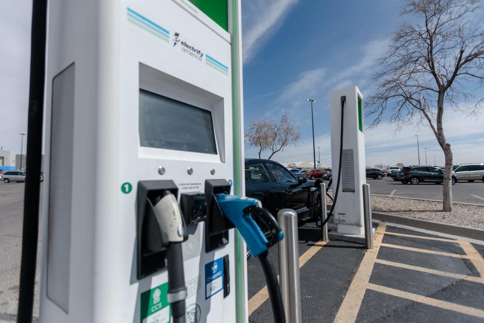 A car is being charged at the Walmart Supercenter at 10727 Gateway Blvd West, in East El Paso, Texas, Wednesday morning, Feb. 23, 2022.