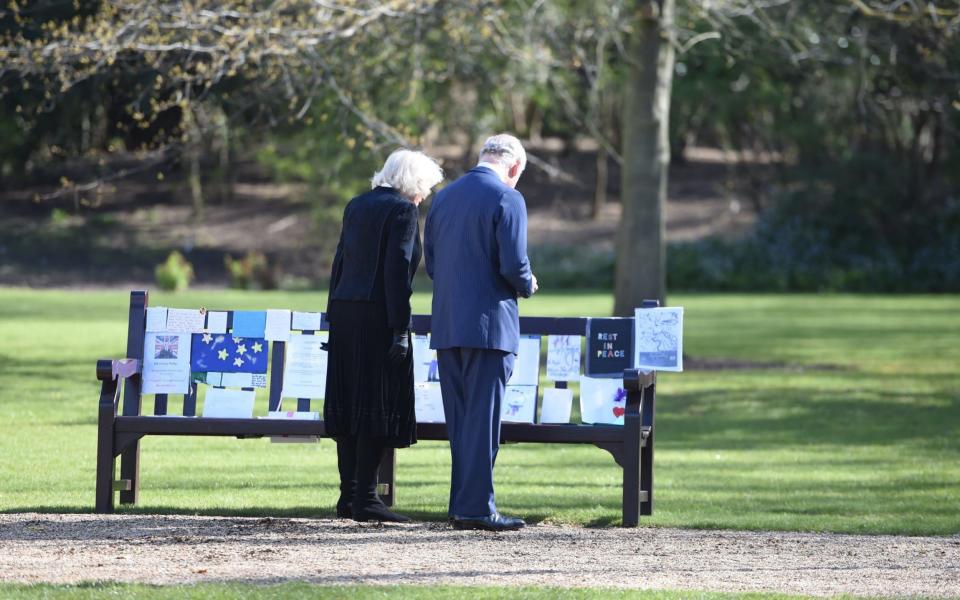 The Prince of Wales and the Duchess of Cornwall visit the gardens of Marlborough House, London, to view the flowers and messages left by members of the public outside Buckingham Palace - Jeremy Selwyn