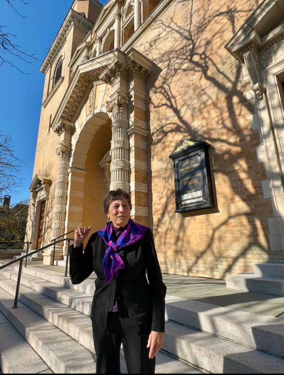 The Rev. Rebecca Spencer stands outside Central Congregational Church on Angell Street in Providence, where she has served as pastor for 35 years.