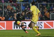 Football Soccer - Frosinone v Juventus Serie A - Matusa Stadium, Frosinone, Italy - 07/02/16. Juventus' Paulo Dybala shoots to score against Frosinone. REUTERS/Max Rossi