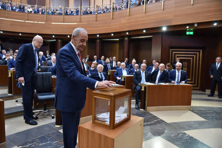 Lebanon's parliamentary re-elected speaker Nabih Berri casts his vote as Lebanon's newly elected parliament convenes for the first time to elect a speaker and deputy speaker in Beirut, Lebanon May 23, 2018. Lebanese Parliament/Handout via REUTERS