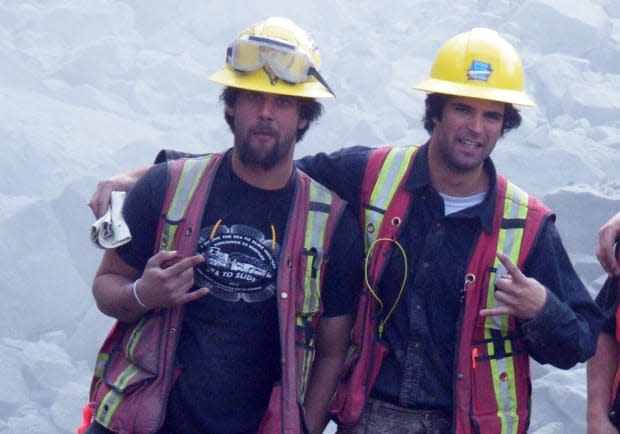 Sam Fitzpatrick's younger brother. Arlen, left, was working beside Sam when he was killed. 