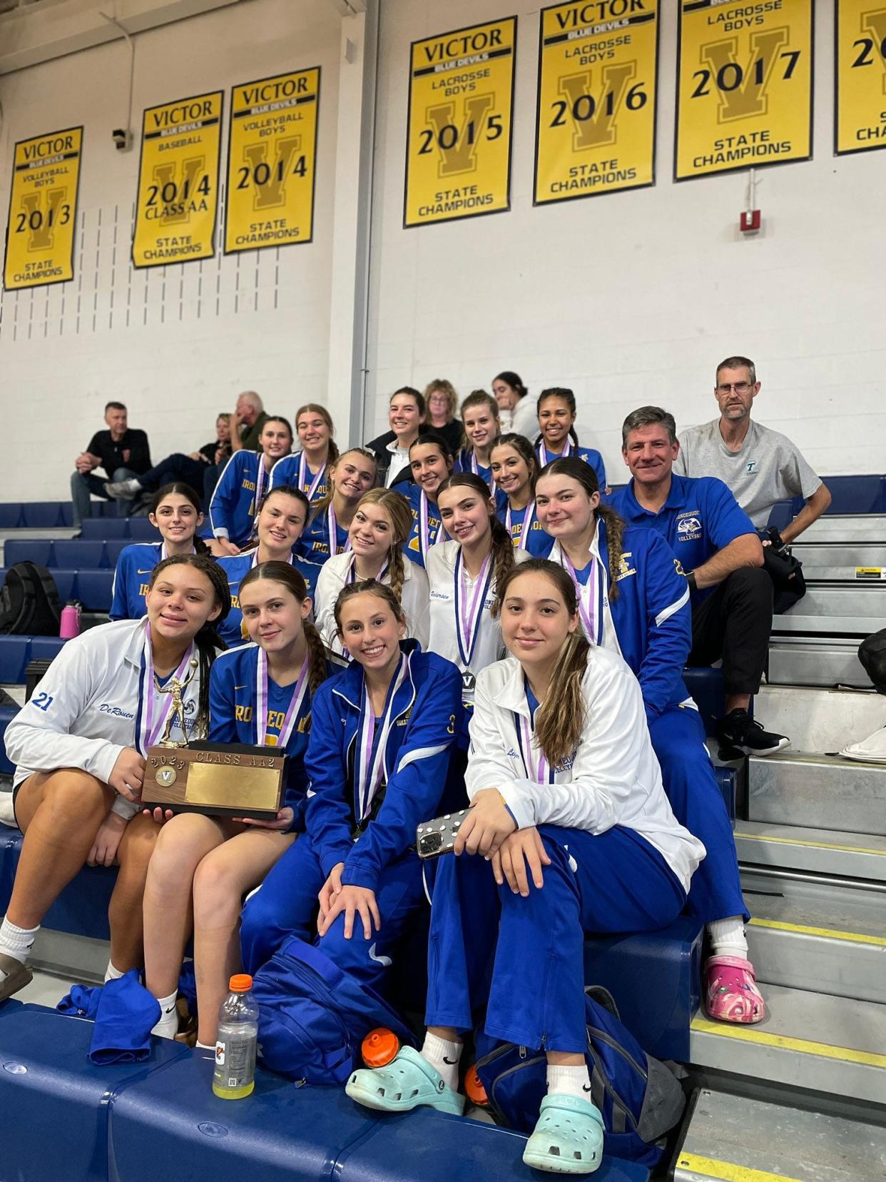 Irondequoit girls volleyball team after winning their second straight Section V Championship, avenging a regular season loss to Spencerport with a 3-1 win in the Class AA2 final Saturday, Nov. 4 at Victor.