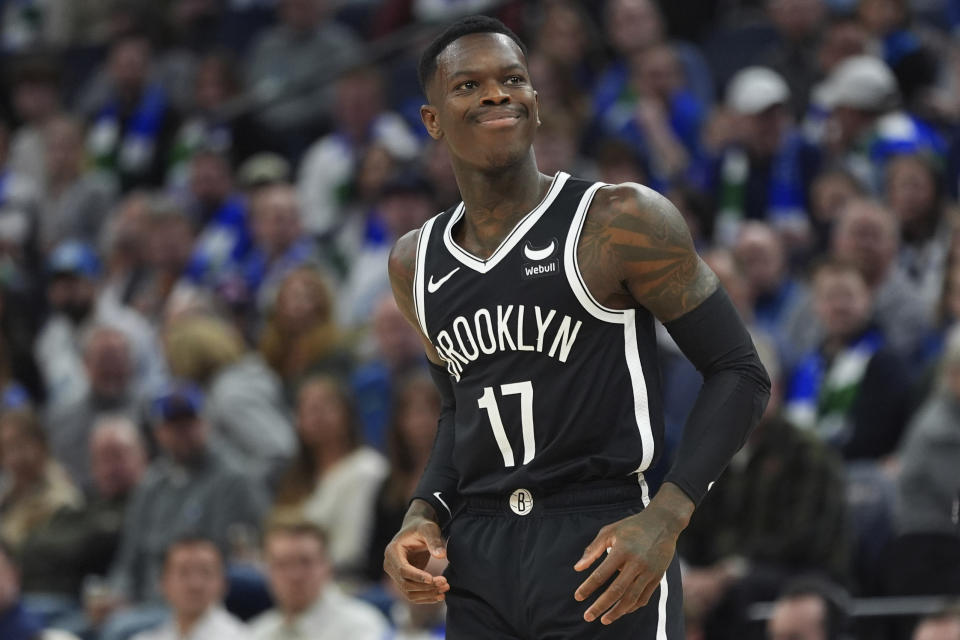 Brooklyn Nets guard Dennis Schroder reacts after missing a shot attempt during the first half of the team's NBA basketball game against the Minnesota Timberwolves, Saturday, Feb. 24, 2024, in Minneapolis. (AP Photo/Abbie Parr)