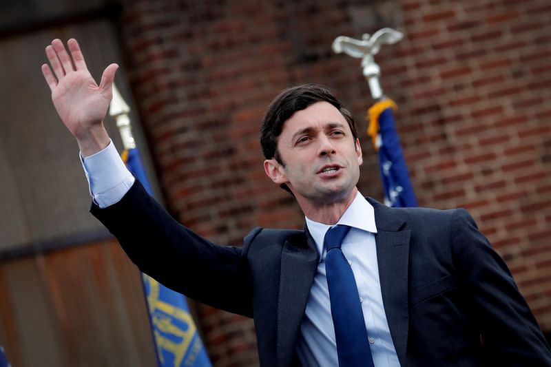 FILE PHOTO: U.S. President-elect Joe Biden campaigns on behalf of Democratic U.S. senate candidates Ossoff and Warnock in Atlanta, Georgia