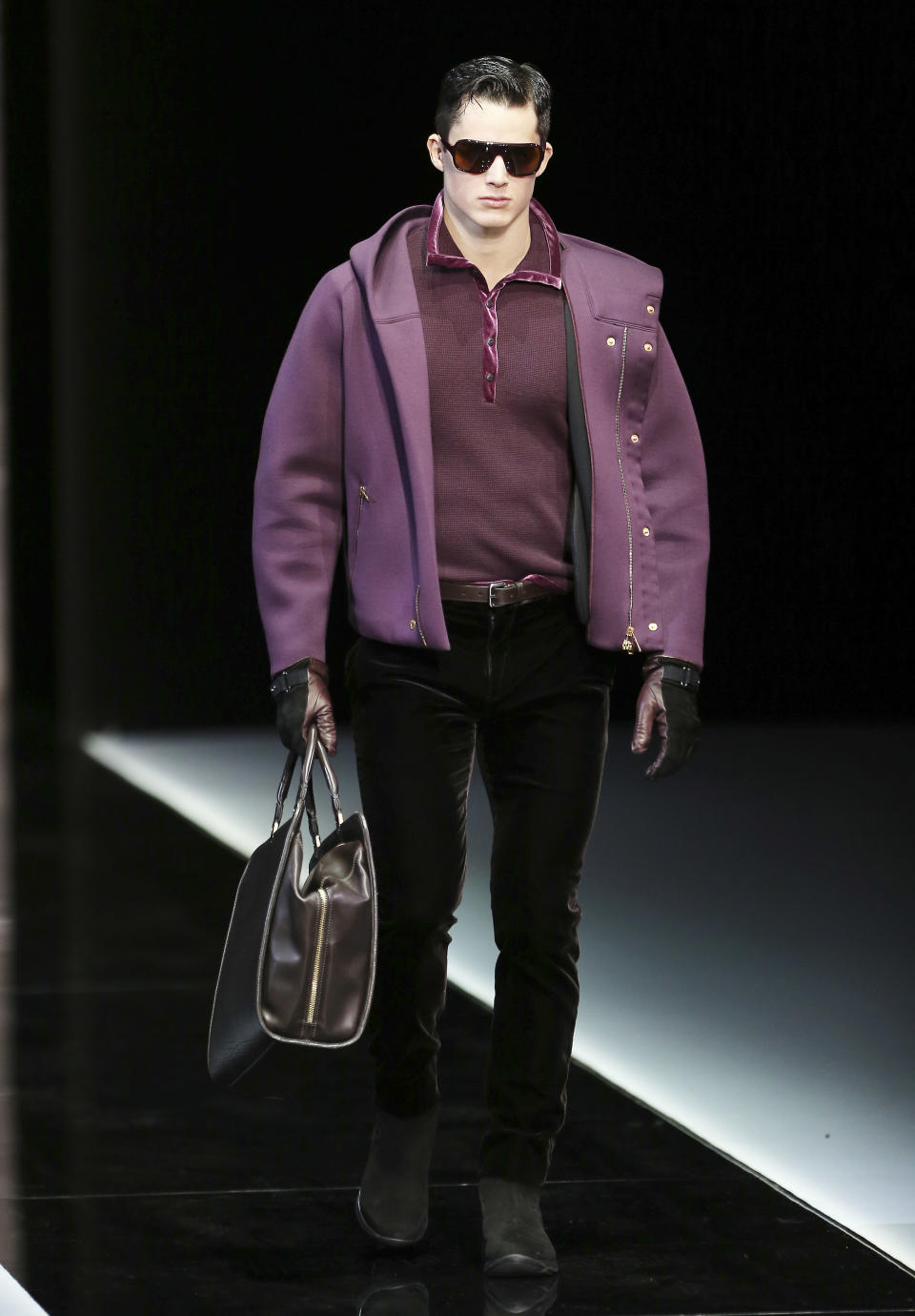 A model wears a creation for Giorgio Armani men's Fall-Winter 2013-14 collection, part of the Milan Fashion Week, unveiled in Milan, Italy, Tuesday, Jan. 15, 2013. (AP Photo/Antonio Calanni)