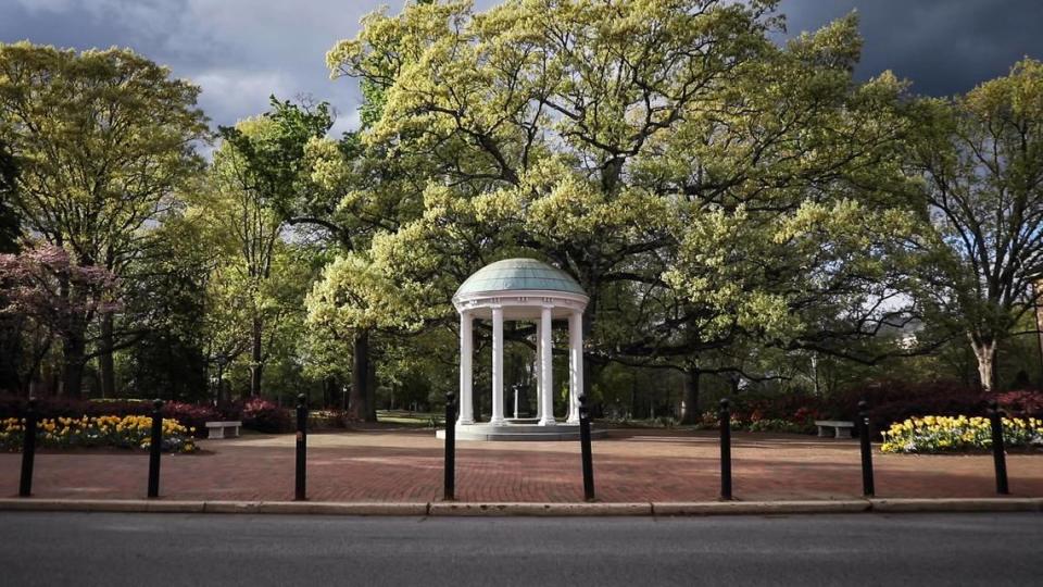 The Old Well on UNC-Chapel Hill’s campus is without its usual spring-time visitors on the evening of April 1, 2020. University campuses across North Carolina had closed that March to prevent the spread of COVID-19.