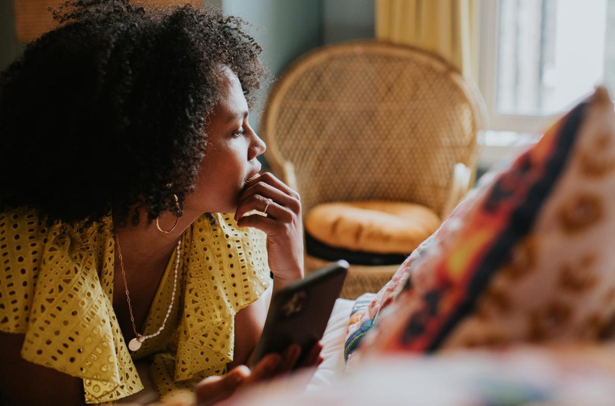 A woman looking distracted