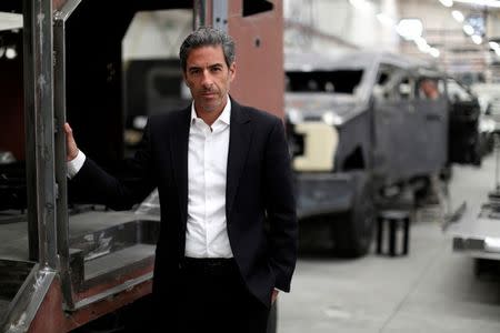 Ernesto Mizrahi, Managing Director of EPEL Blindajes company, poses for a photo at the company's garage after an interview with Reuters in Mexico City, Mexico April 9, 2018. Picture taken April 9, 2018. REUTERS/Gustavo Graf